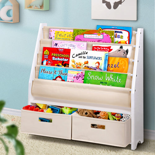 Children's bookshelf with books and toys against a light blue wall.