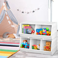 White toy storage unit with colorful toys in a child's playroom.