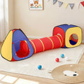 Colorful play tunnel for children on a wooden floor with toys around